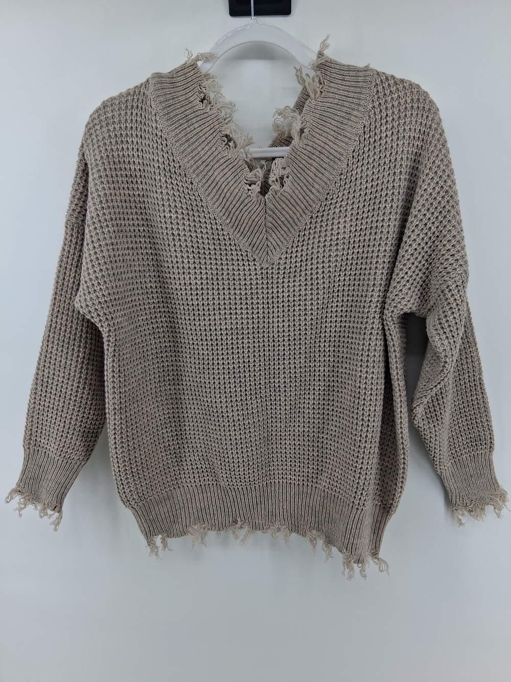 Frayed V‑Neck Chunky Knit Sweater in Taupe